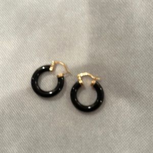 Black hoop earrings with gold clasps